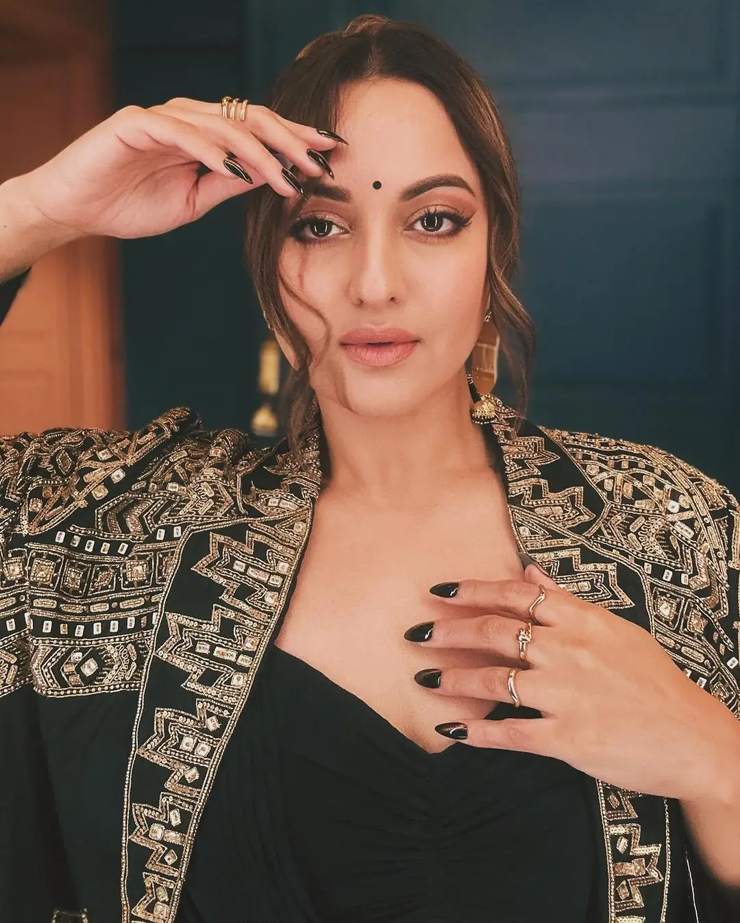 SONAKSHI SINHA STILLS IN BEAUTIFUL EARRINGS BLACK LEHENGA CHOLI